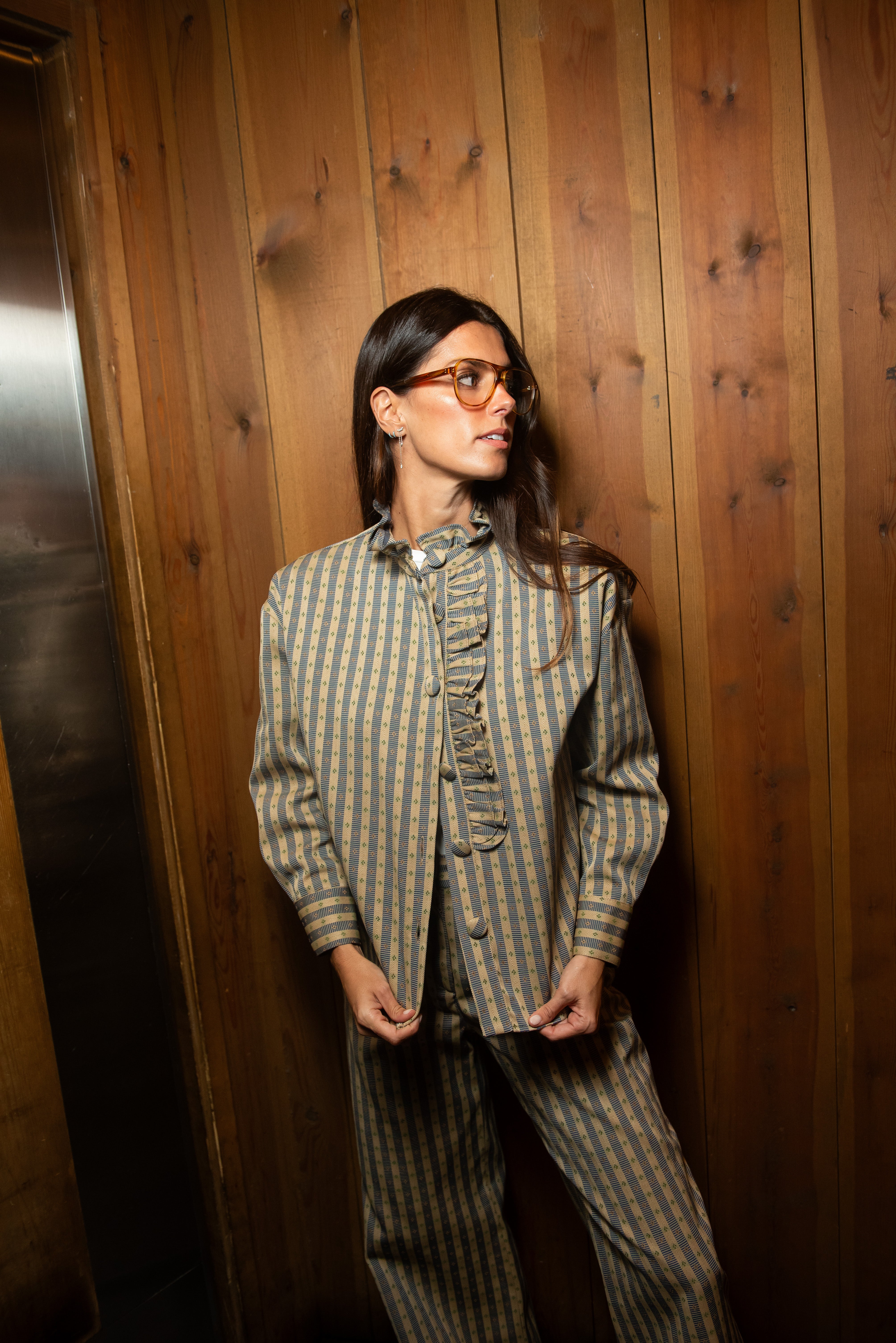 Calças listradas azuis para o cancro